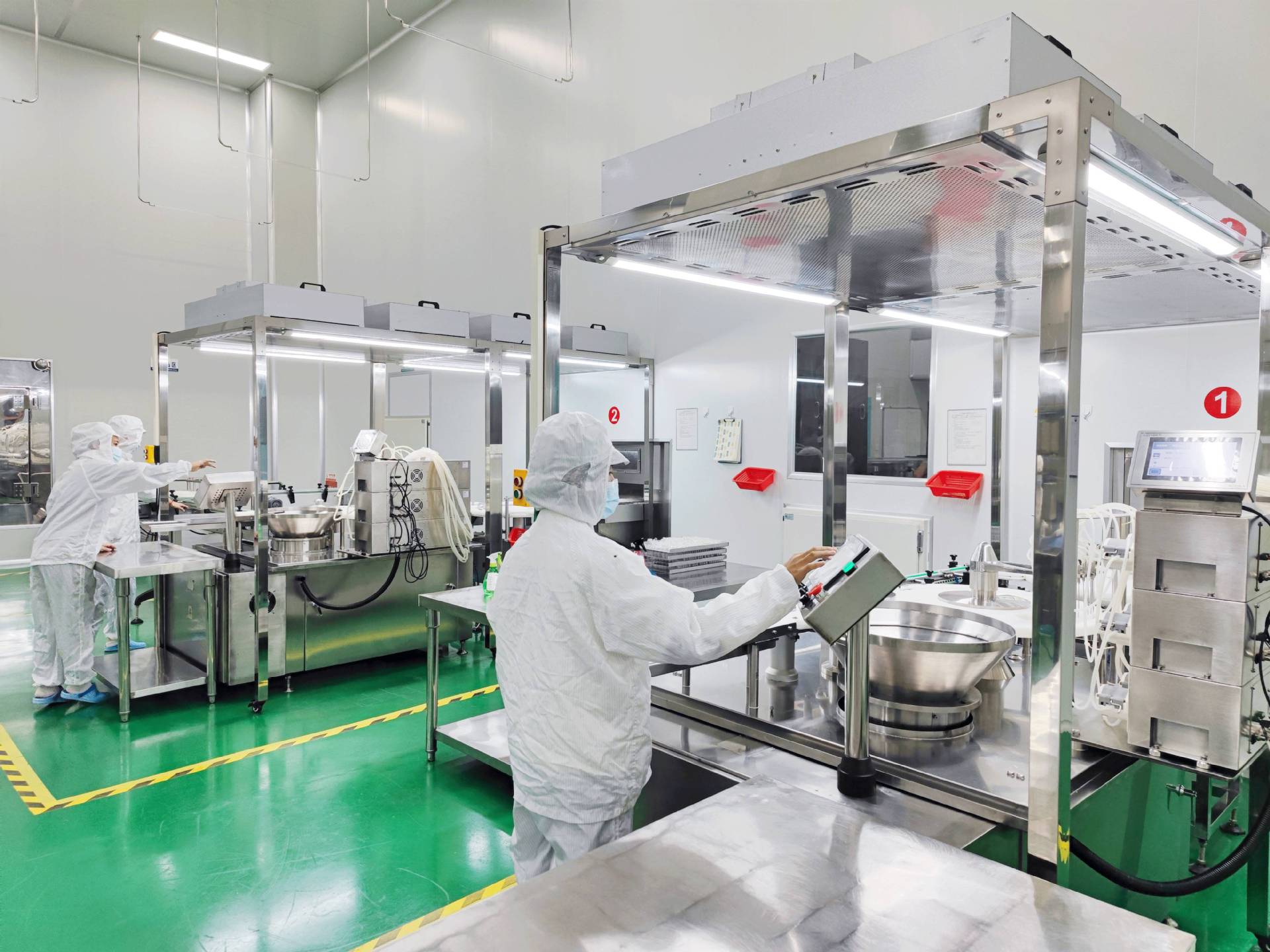 Technical staff working on the WBS production line